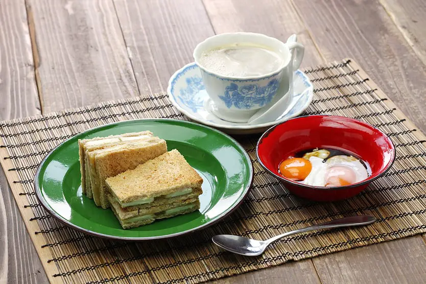kaya jam toast with a cup of white coffee