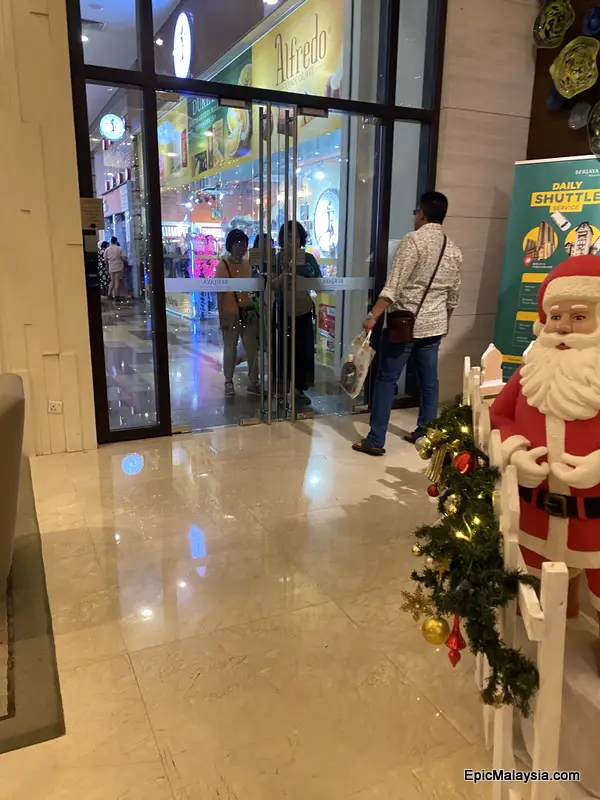 Berjaya Times Square Hotel reception with door to shopping mall