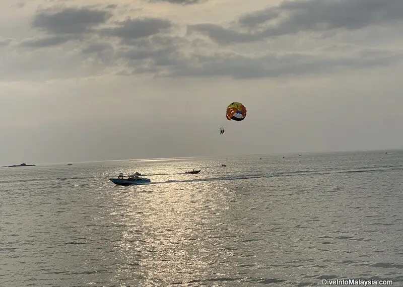 Parasailing at sunset at Pantai Cenang Langkawi